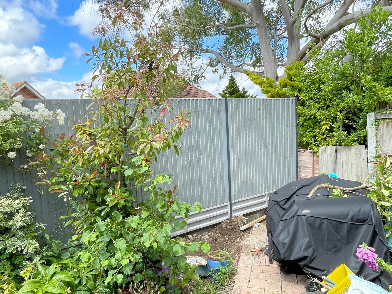Grey fence installation project in Kent