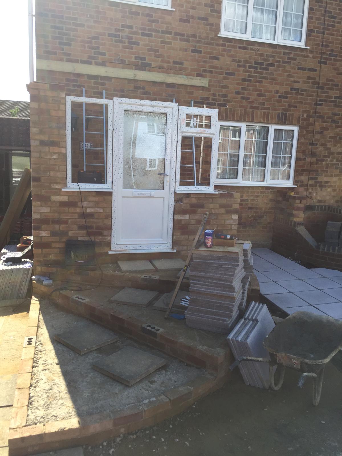 Grey slab installation on step area for local landscaping project