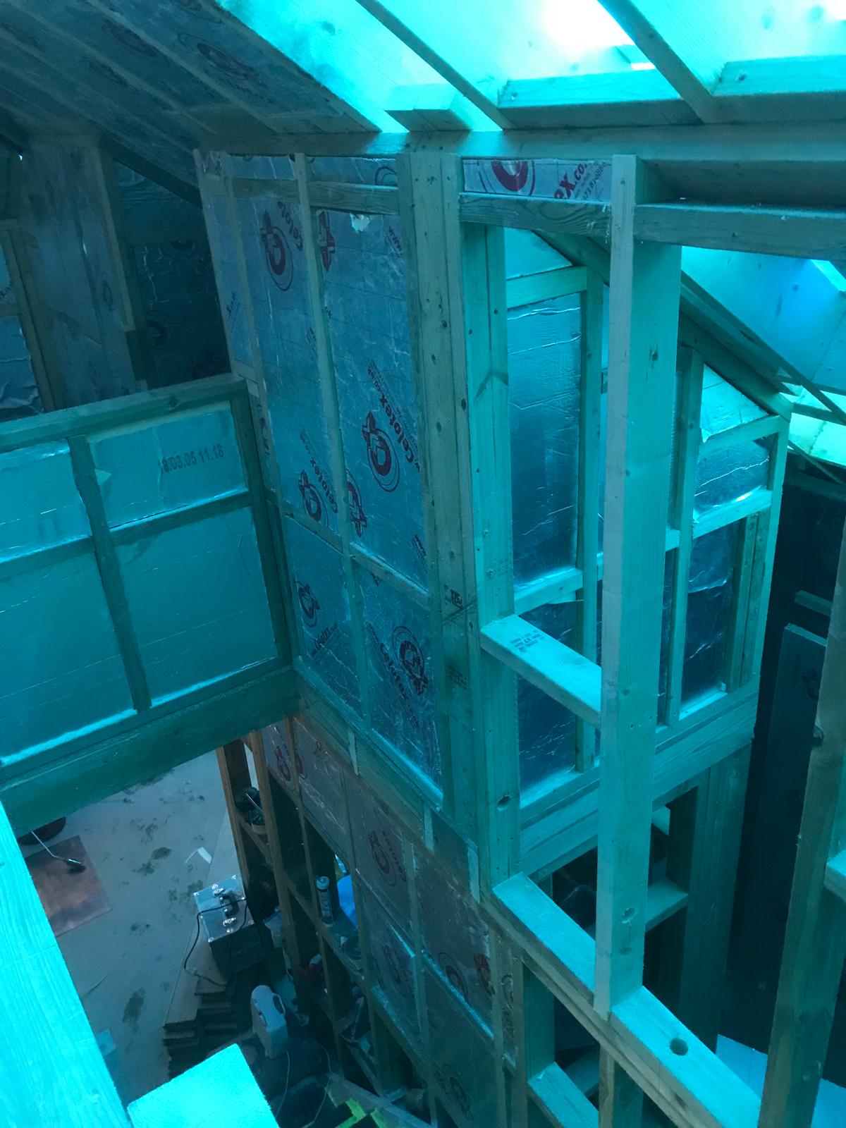 Installation of insulation upstairs of the stone extension project in Kent