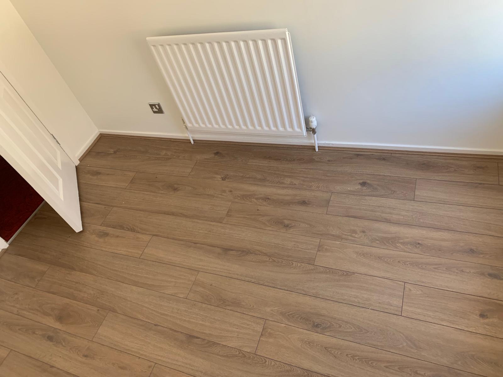 Installed laminate floor for a local decorating project