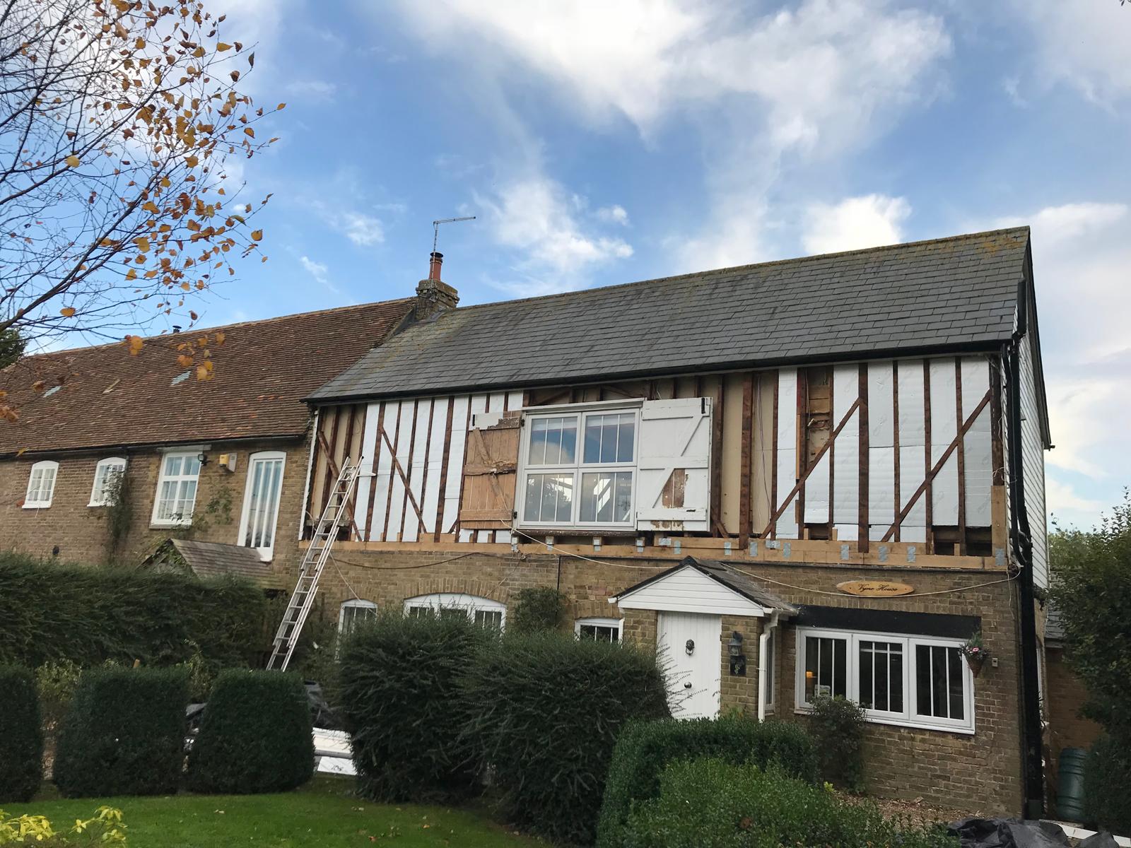 Insulation installation on the exterior of a house in prepartion for cladding installation