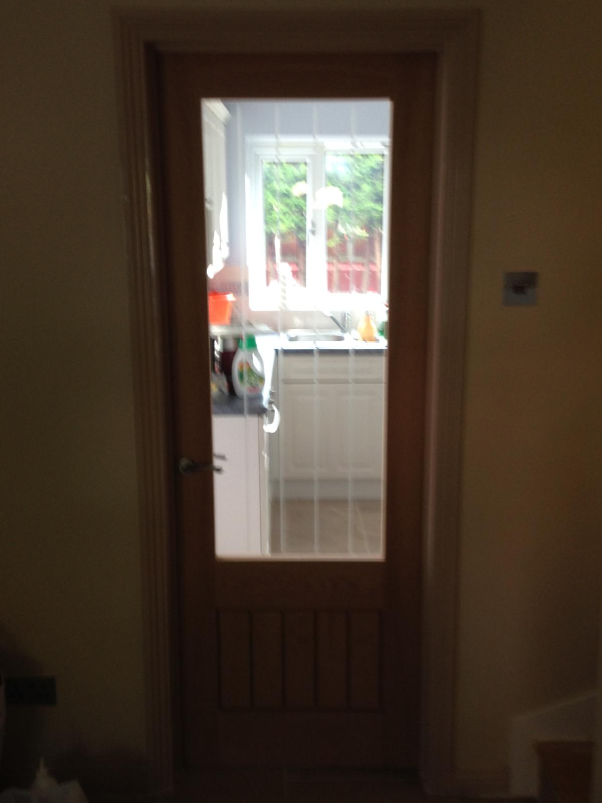 Interior door with Glass window installation for a decorating project