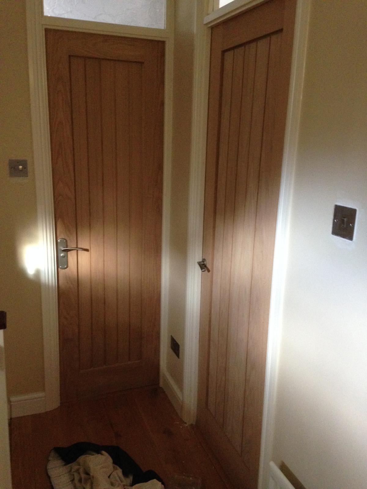 Interior straight panel door installation