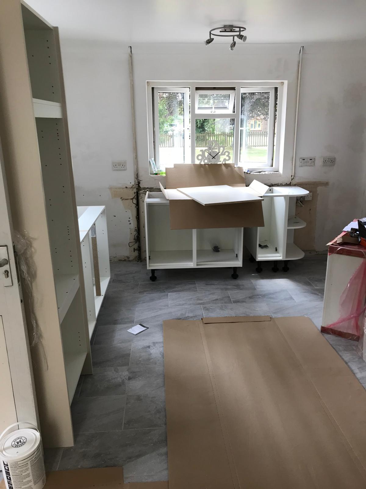 Kitchen installation carcasses being installed