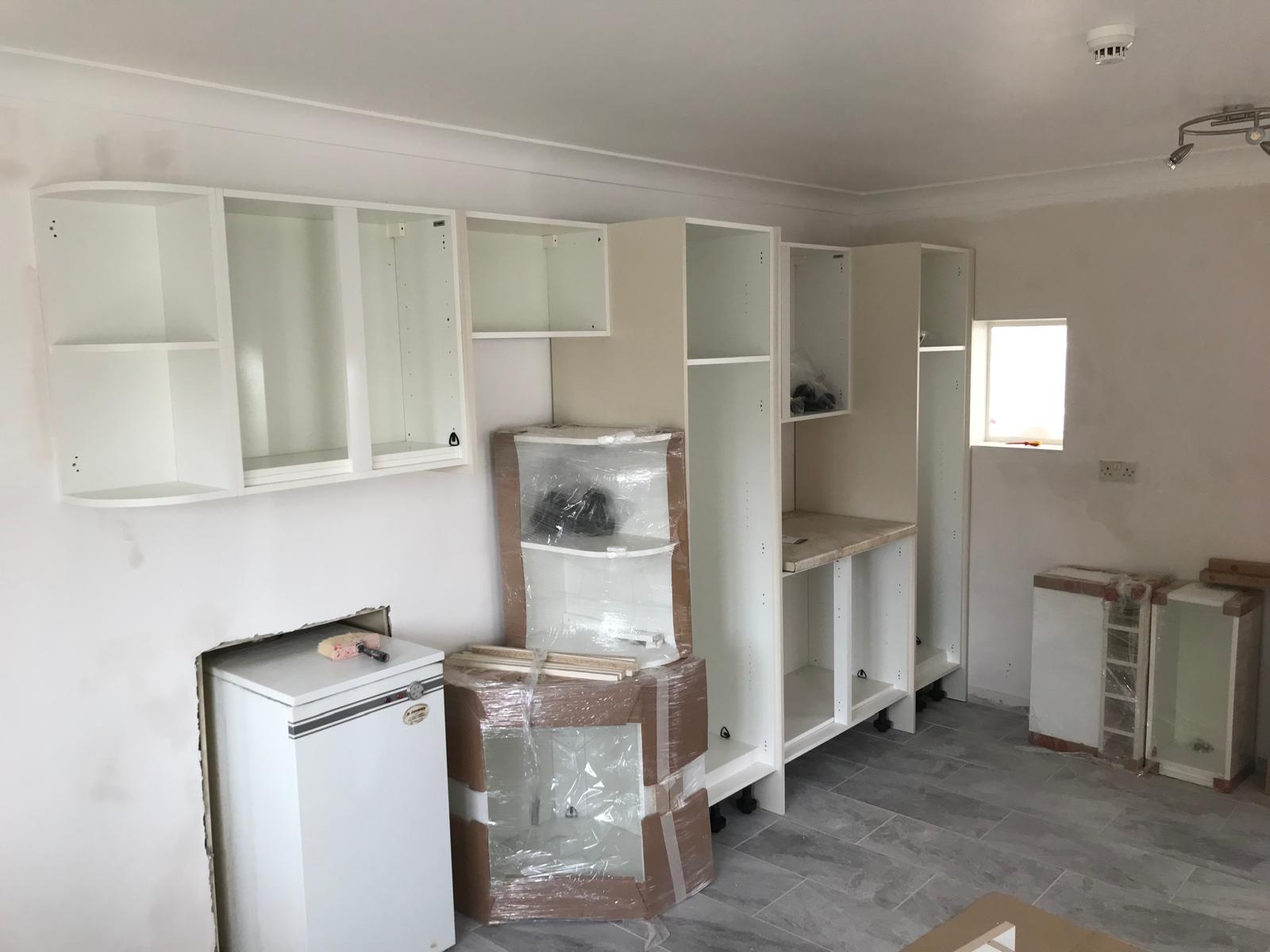 Kitchen installation project carcasses being installed