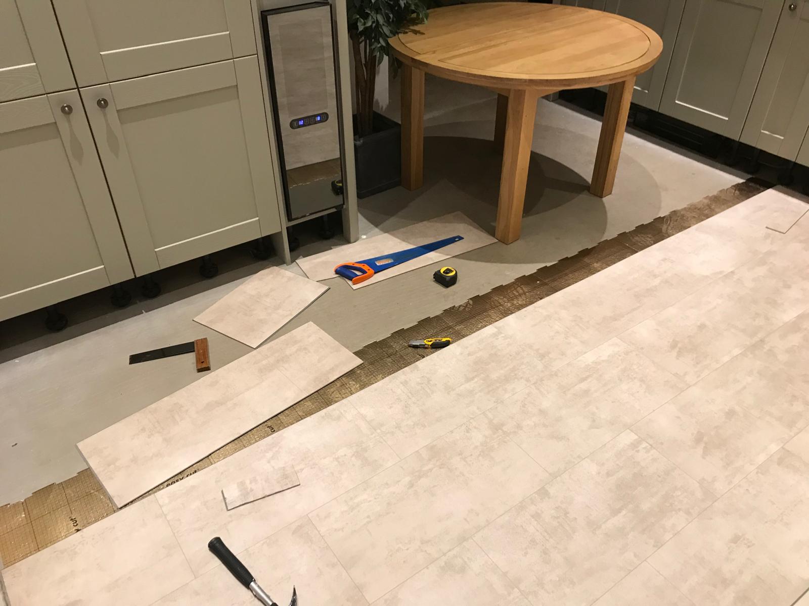 Laminate floor installation on local kitchen extension project