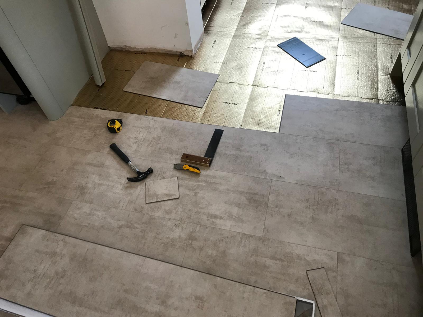Laminate floor installation on local kitchen project