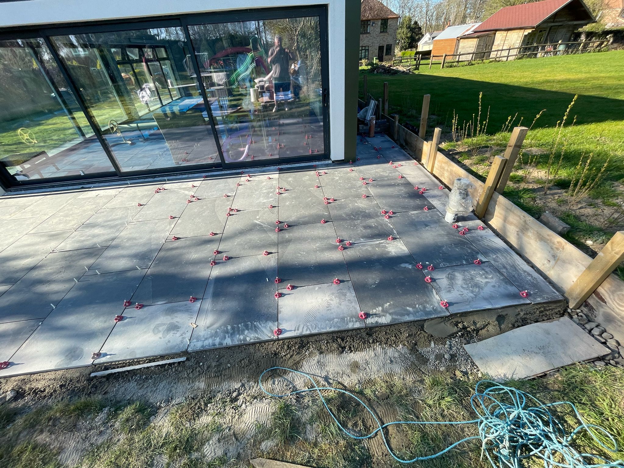 Last section of slabs outside swimming pool build