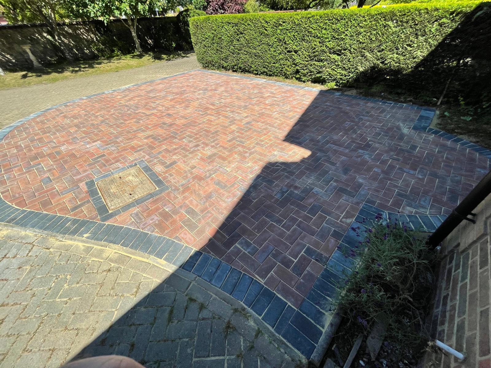Local driveway installation with dark grey curved outer edge