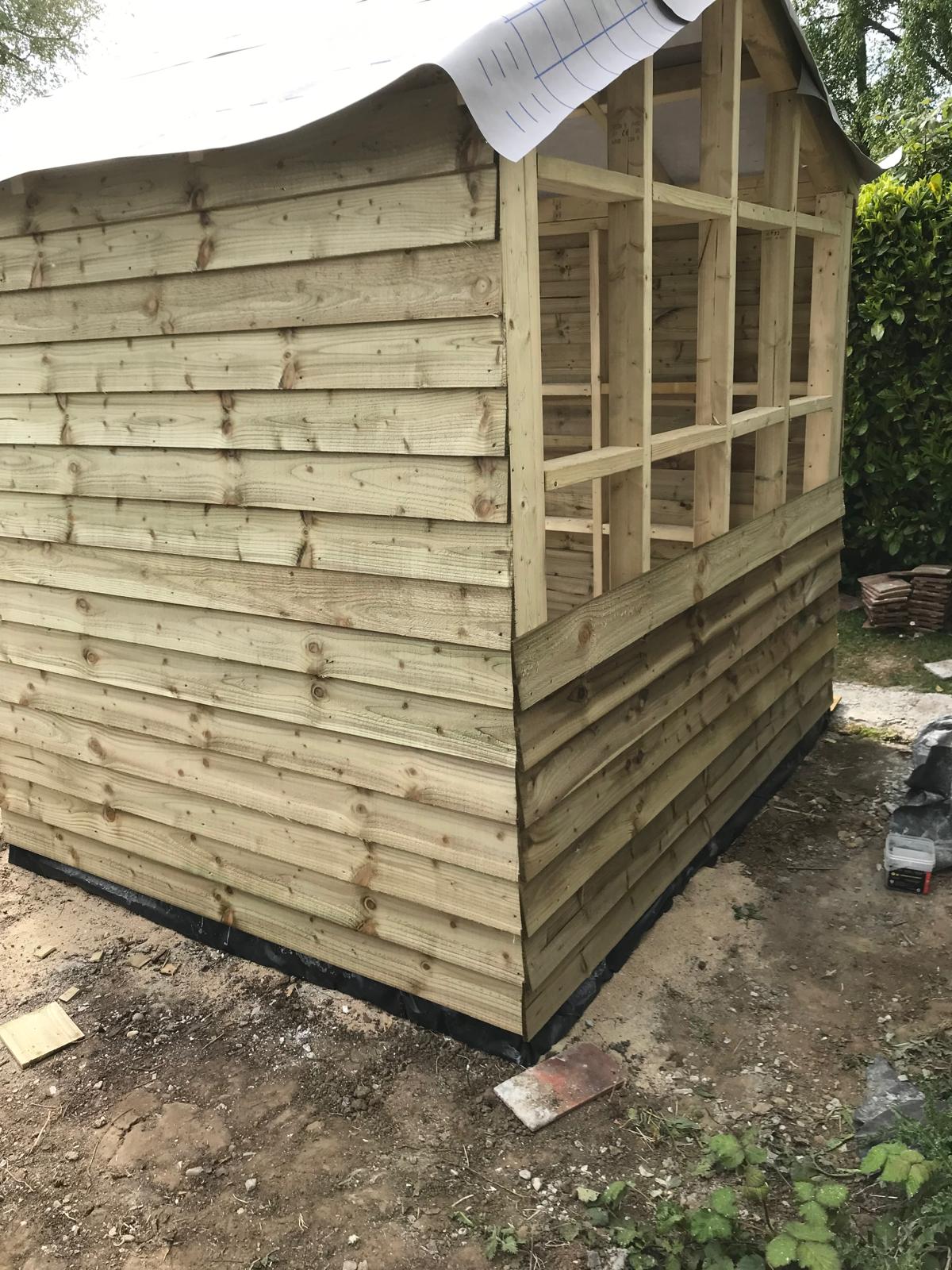 Local landscaping project custom shed build
