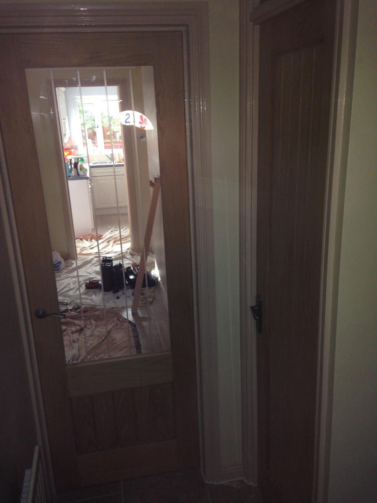 Mirrored door installation for a decorating project
