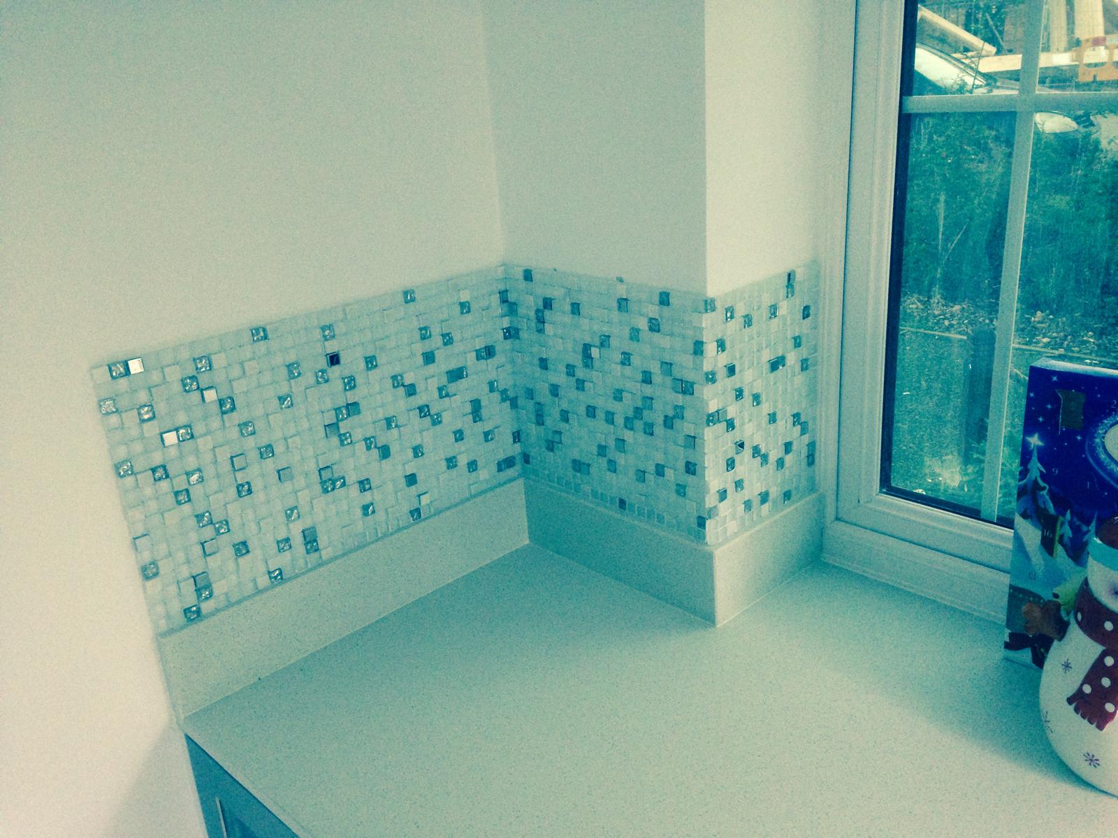 Mosaic wall tile installation for a local kitchen decorating project in Kent
