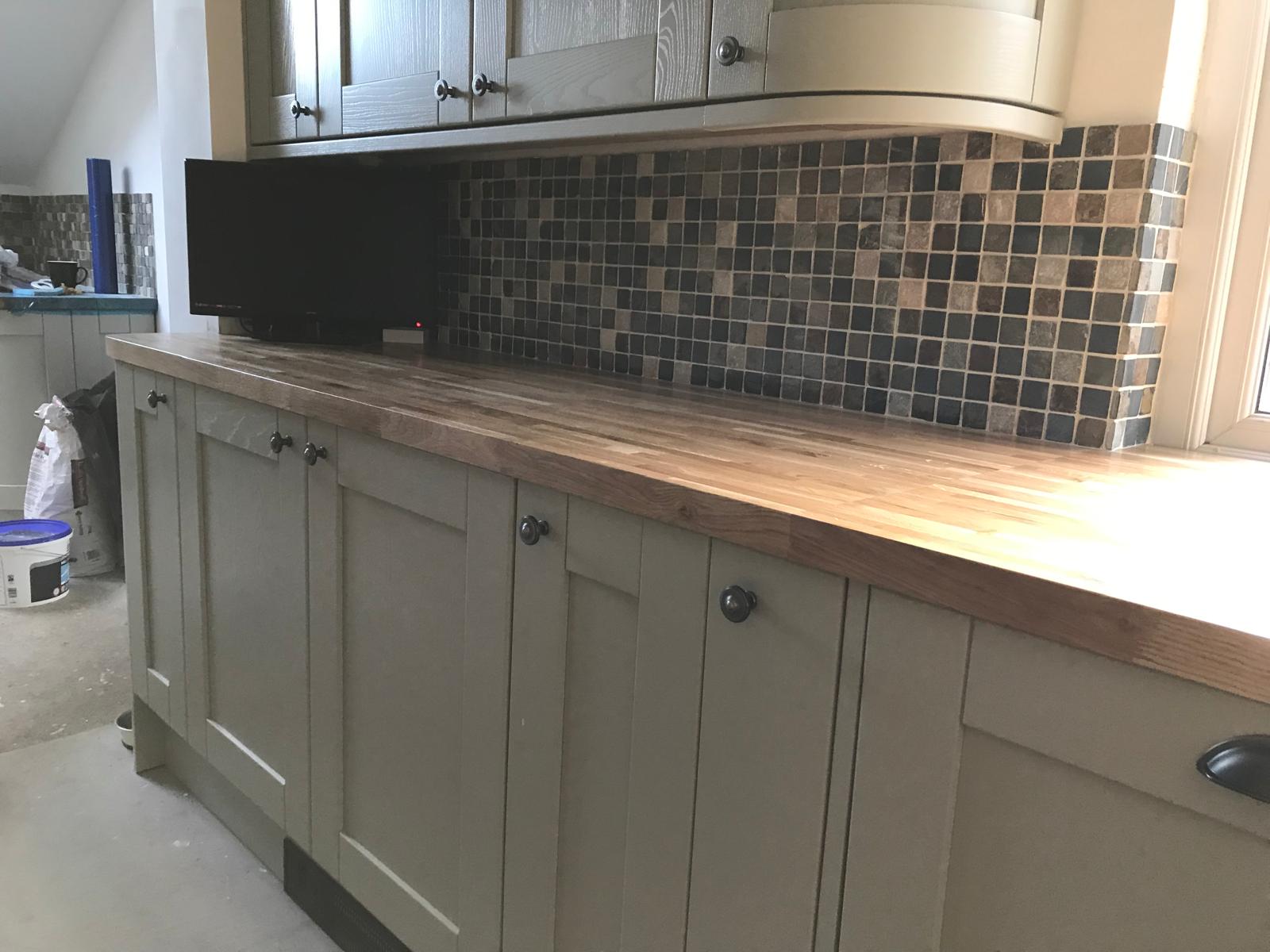 Mosaic wall tile installation on local kitchen extension project in Kent