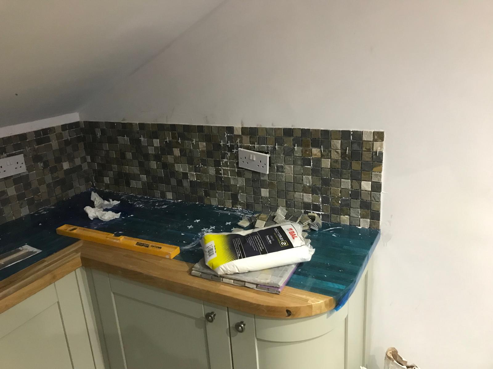 Mosiac wall tile installation on kitchen extension project