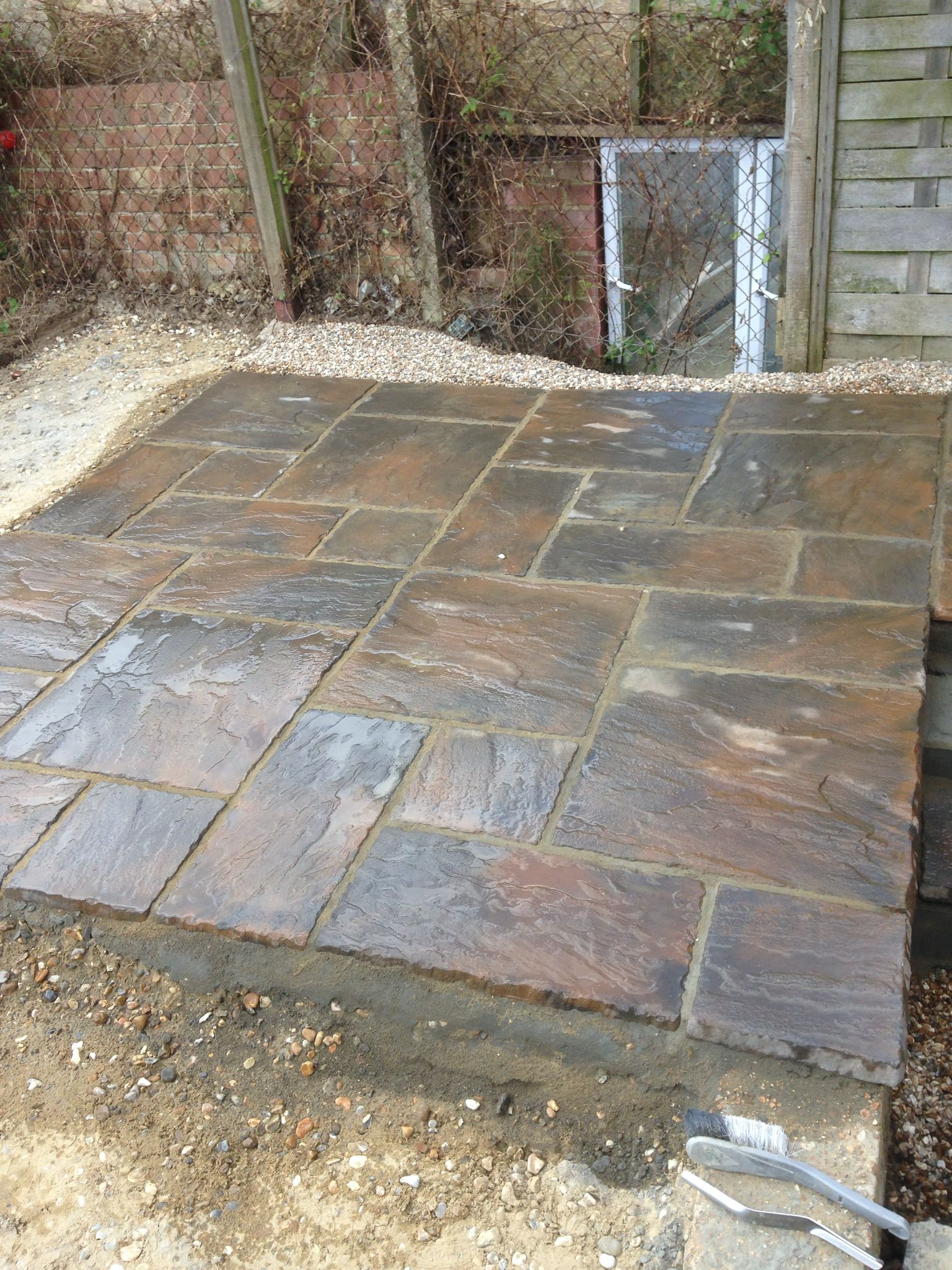 Multi sized patio installation for a local landscaping project in Kent