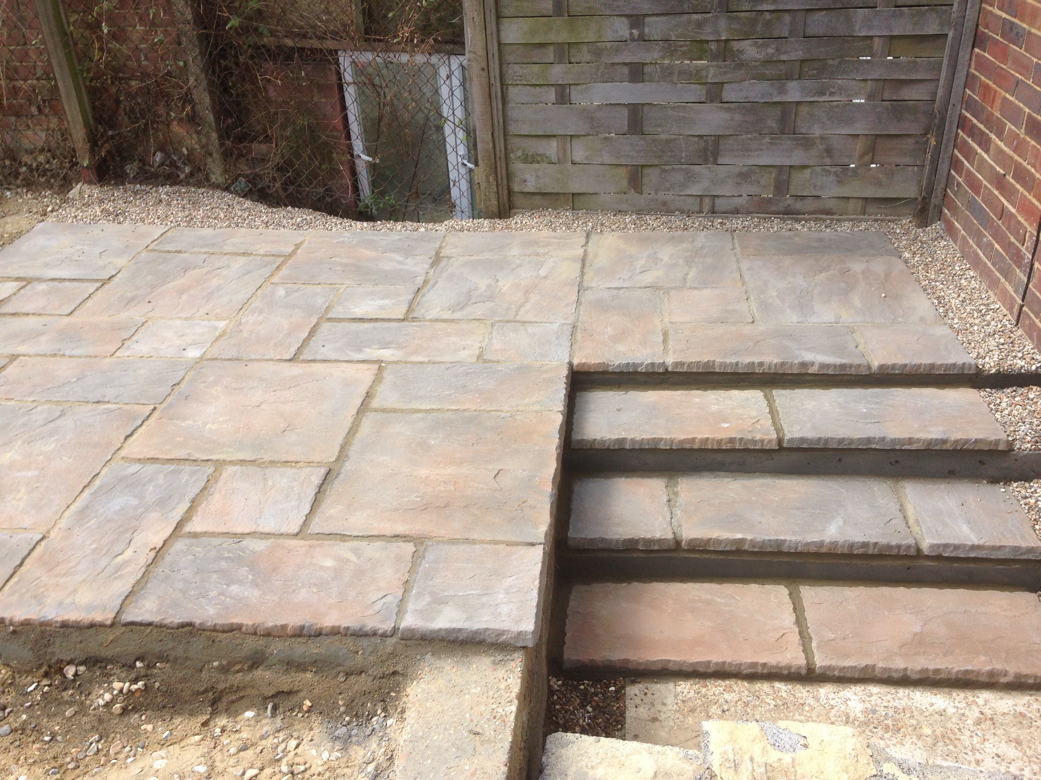 Multi sized patio installation step area for a landscaping project in Kent
