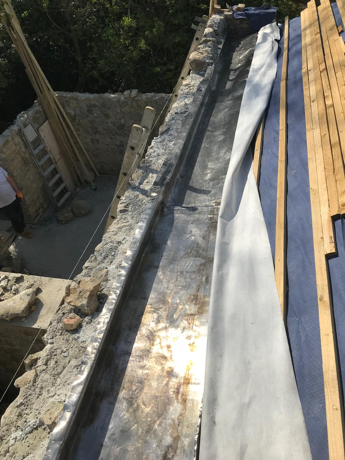 Natural stone extension project roof installation