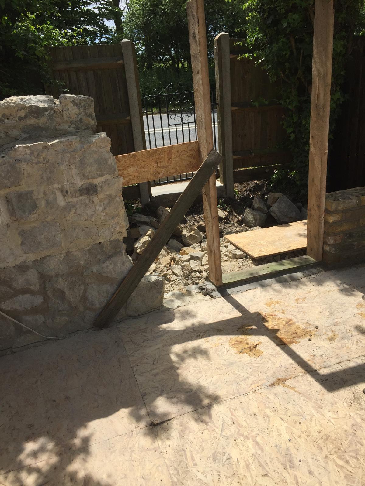 Natural stone wall installation on a local extension project