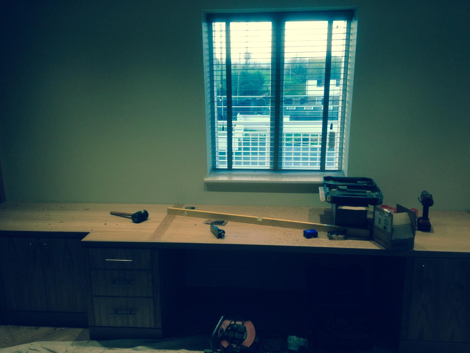 Office area project with custom built shelving for a local decorating job