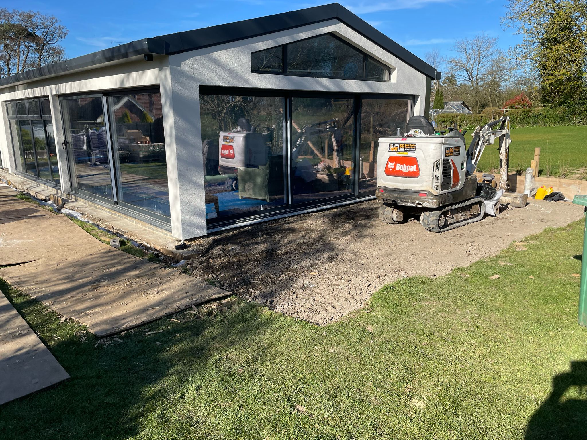 Outside swimming groundworks in preparation for slabs.