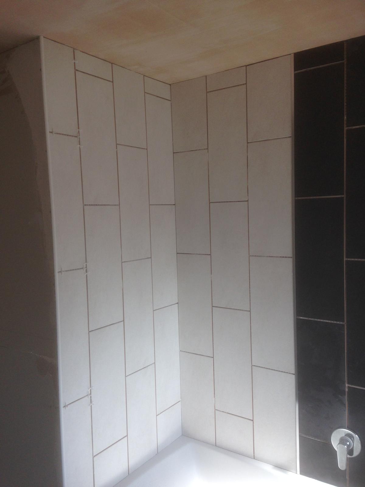 Over the bath wall tile installation 