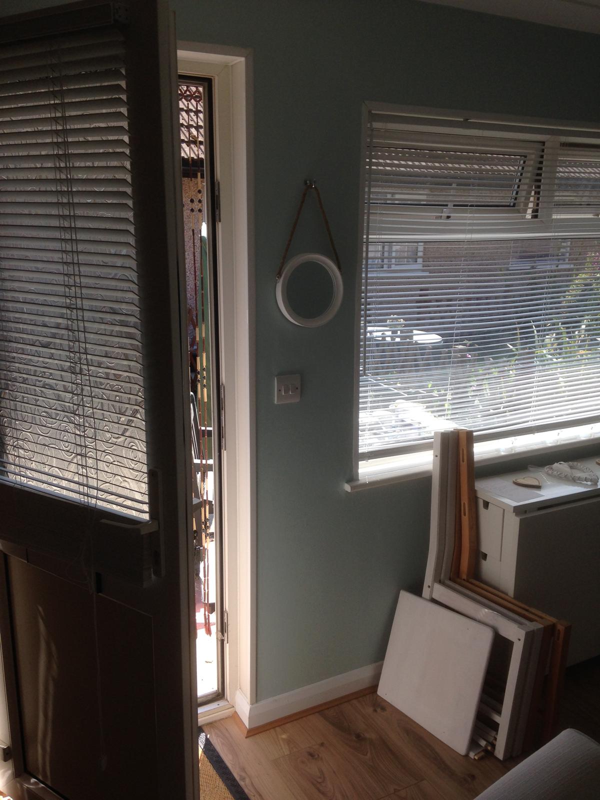 Painting and decorating project with duck egg blue painted walls