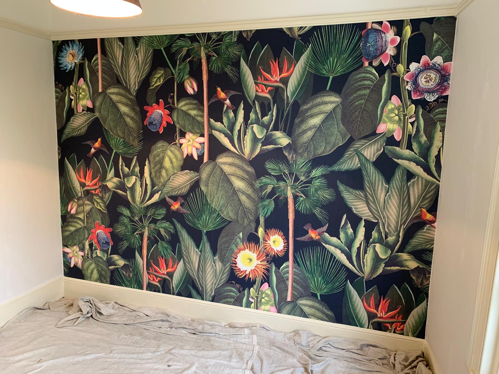 Painting and decorating project with large print wallpaper installation