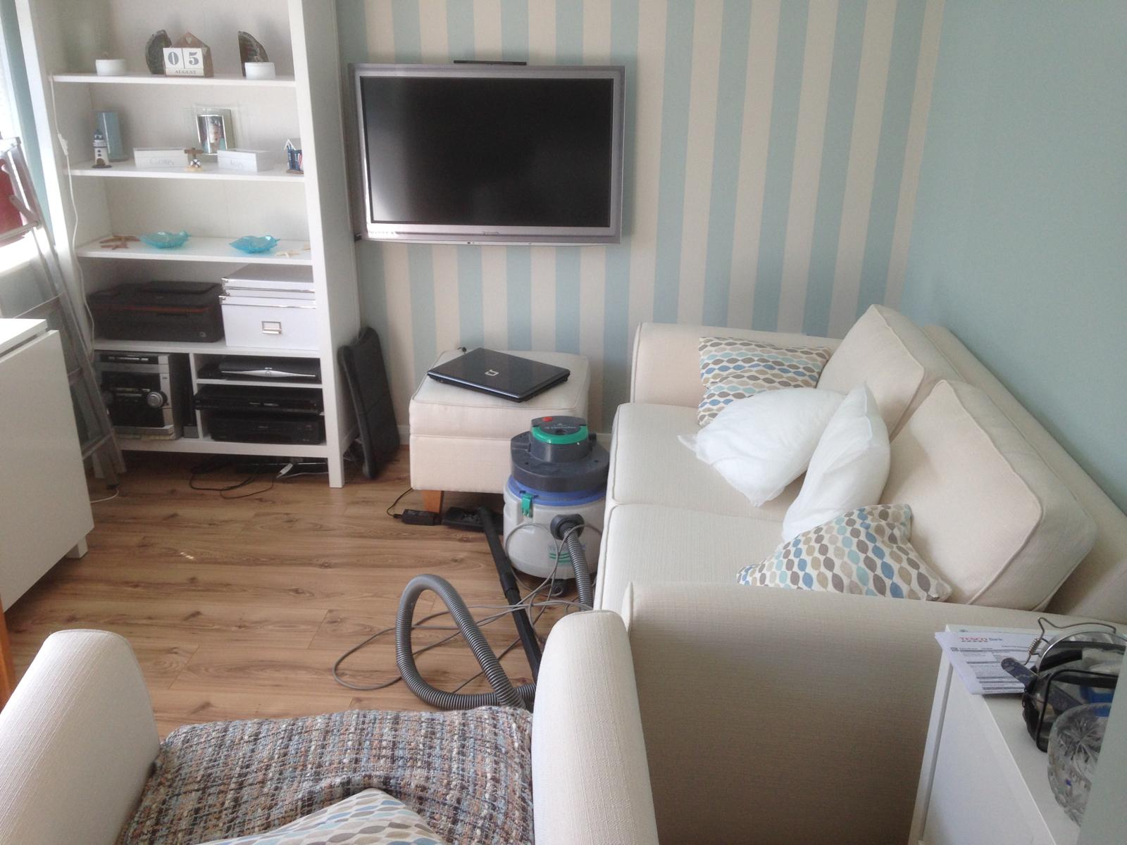 Painting and decorting project with laminate floor stripped wall paper and duck egg blue walls