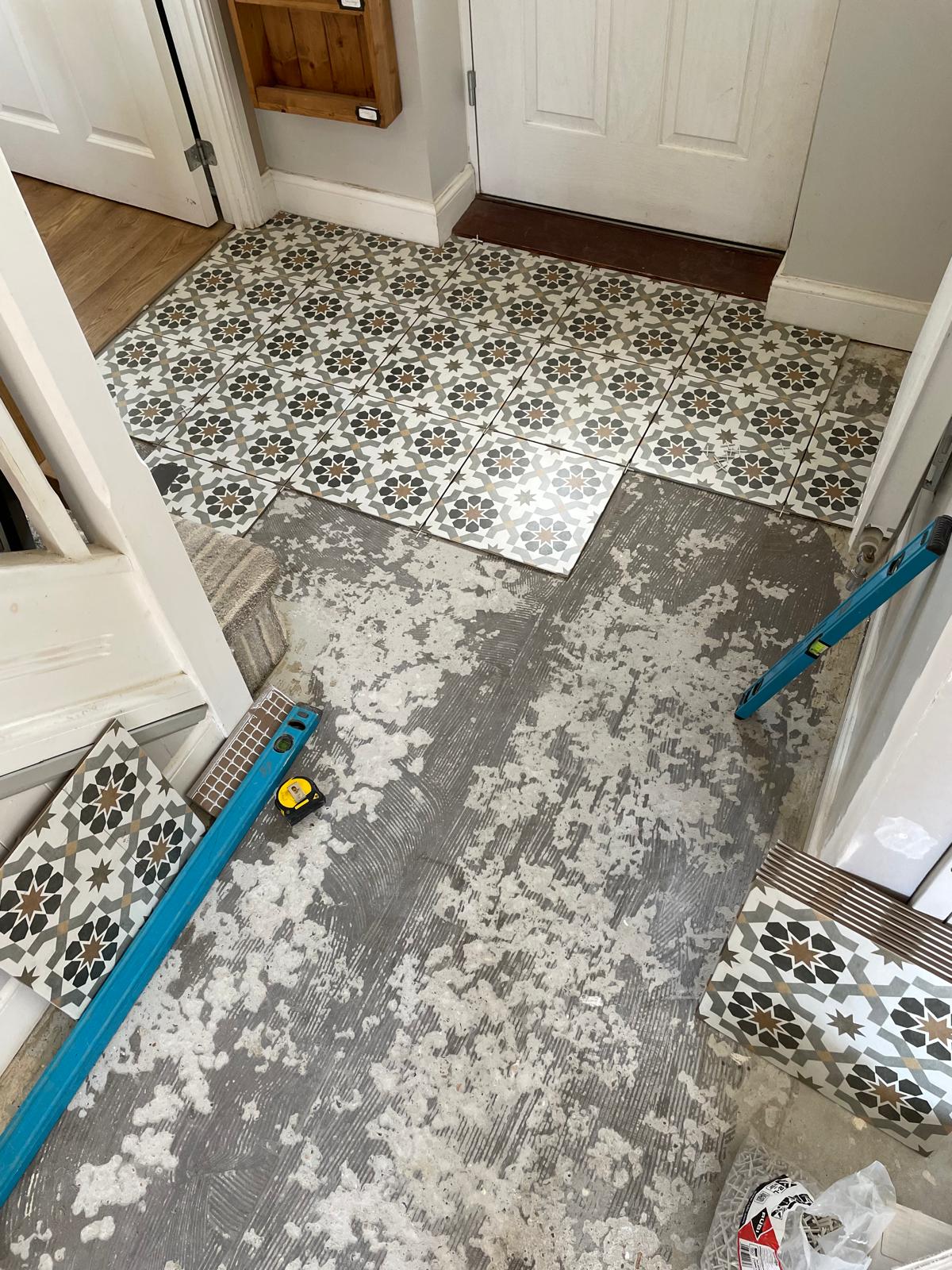 Pattern floor tile installation for a local decorating project in Kent