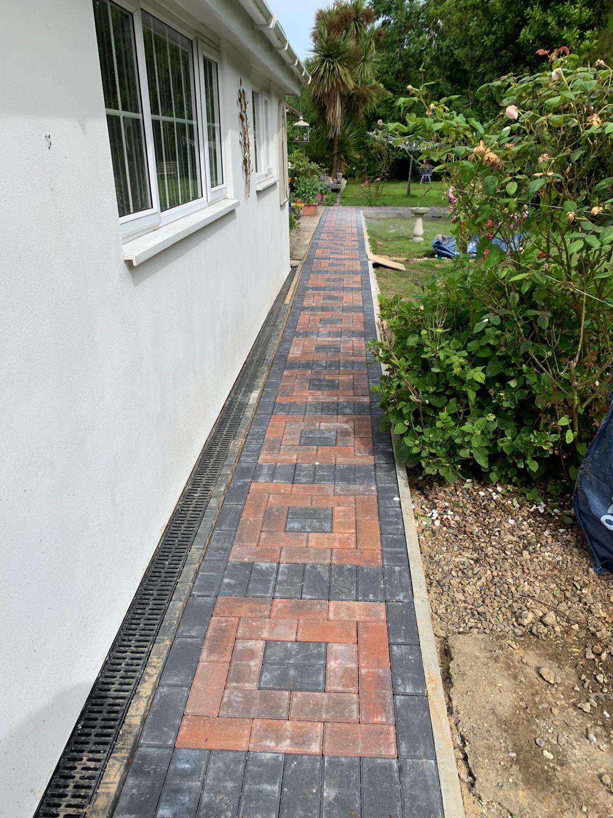 Patterned block paved pathway for a local landscaping project in Kent 