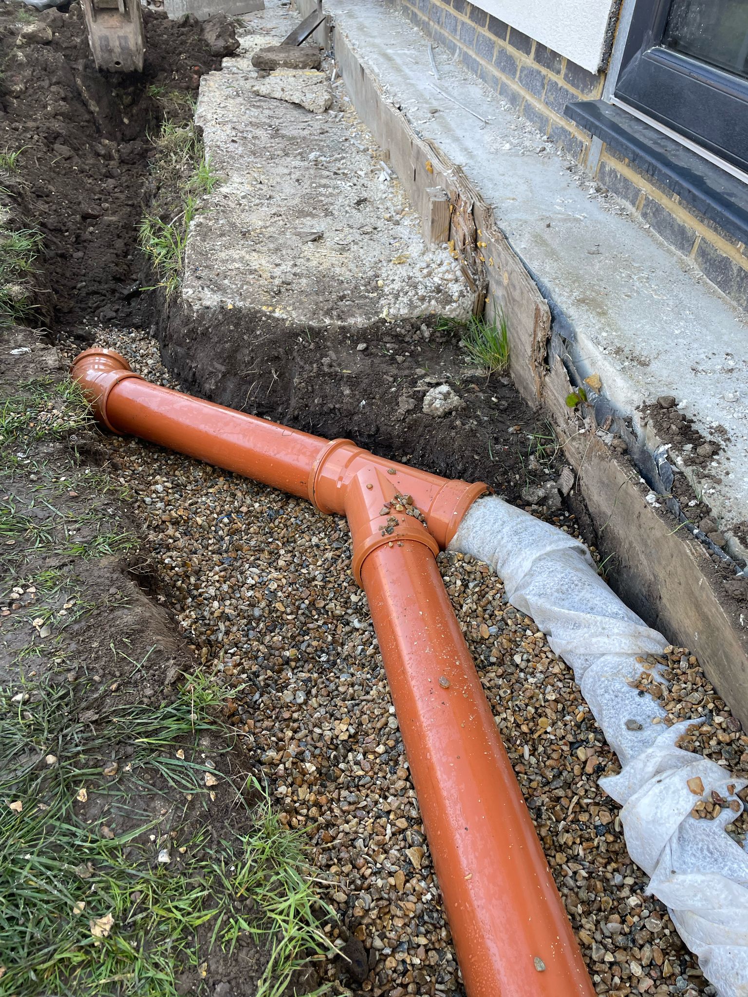 Pipe splits in preparation for installation for swimming pool.