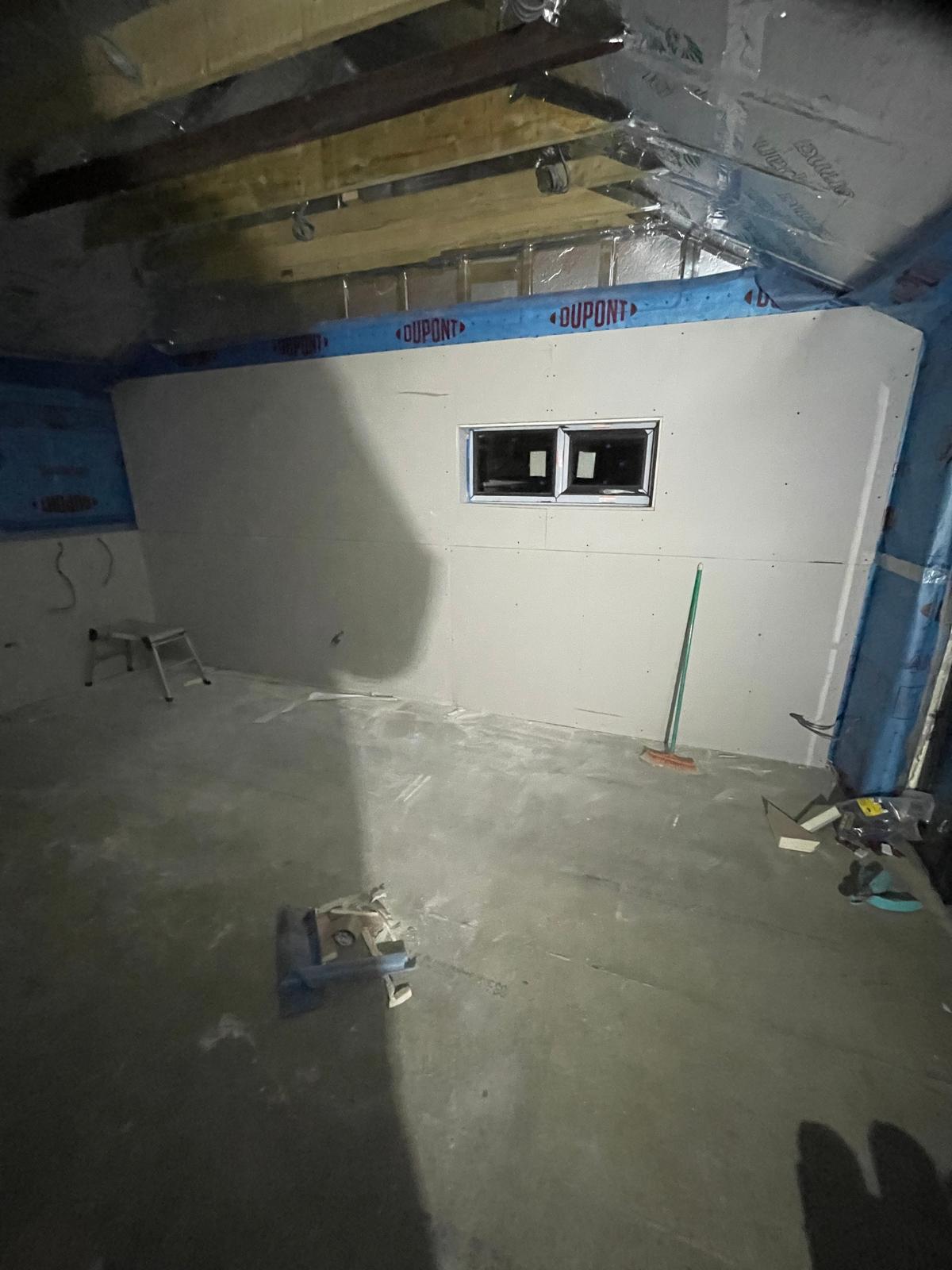 Plasterboard being installed on a local conversion project