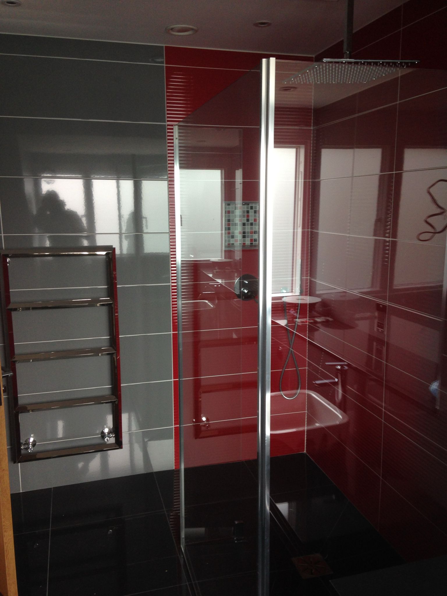 Porcelain red and grey tile installation in shower area for a bathroom project in Kent