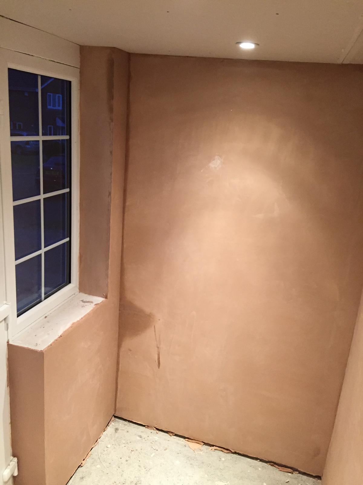 Porch extension project plastered walls