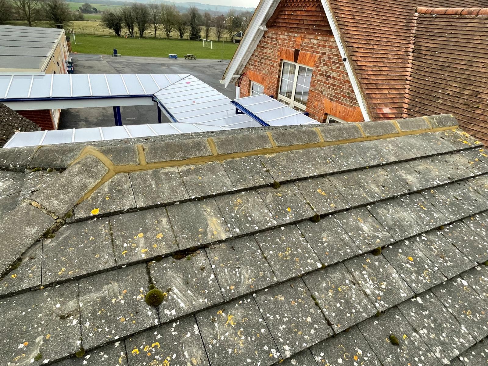 Ridge tile installation on a local roofing project