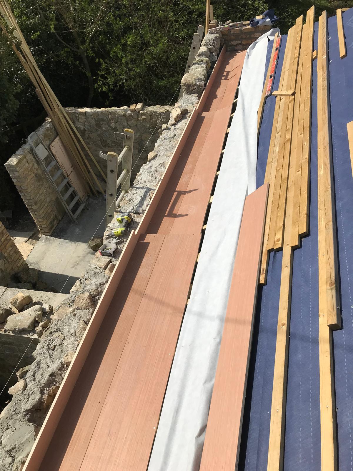 Roof installation on the natural stone extension project