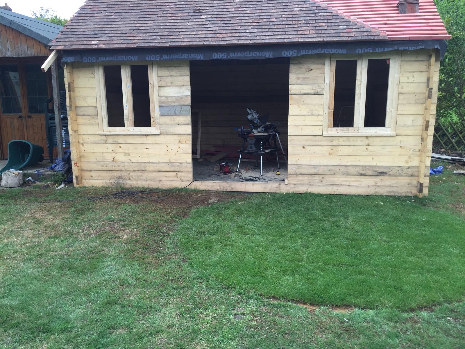 Roof tile installation on a custom summer house project in Kent