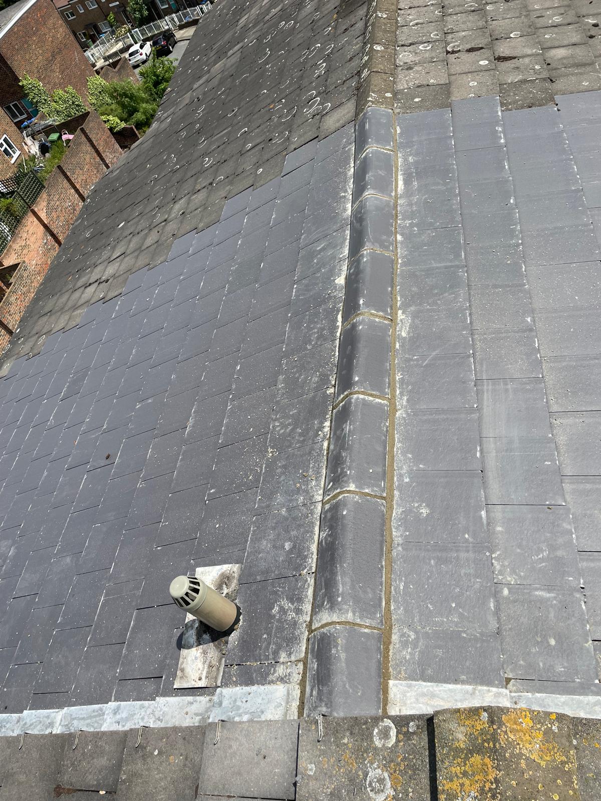 Roof tile installation on a roof repair project