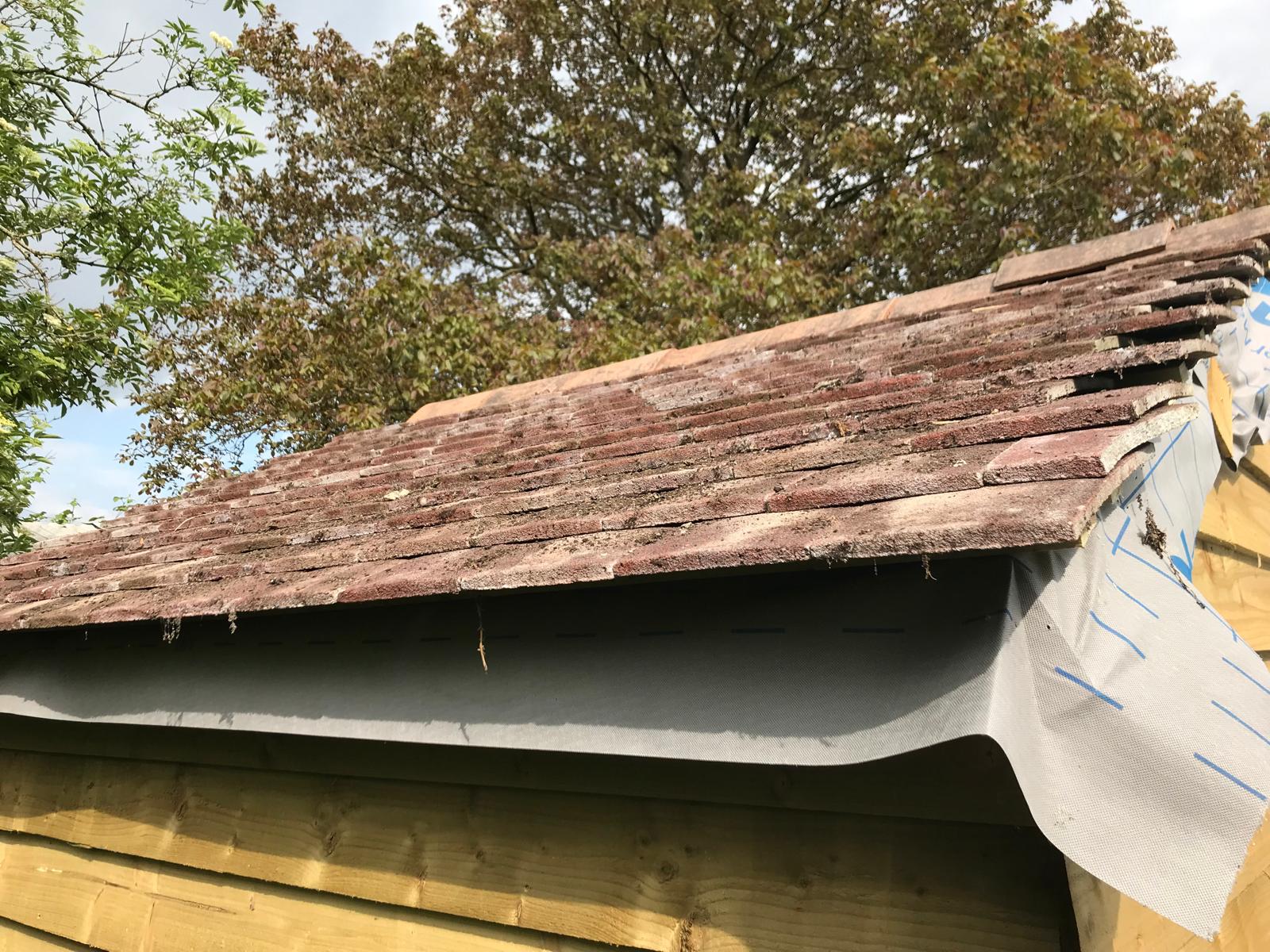 Roof tile installation on custom shed build
