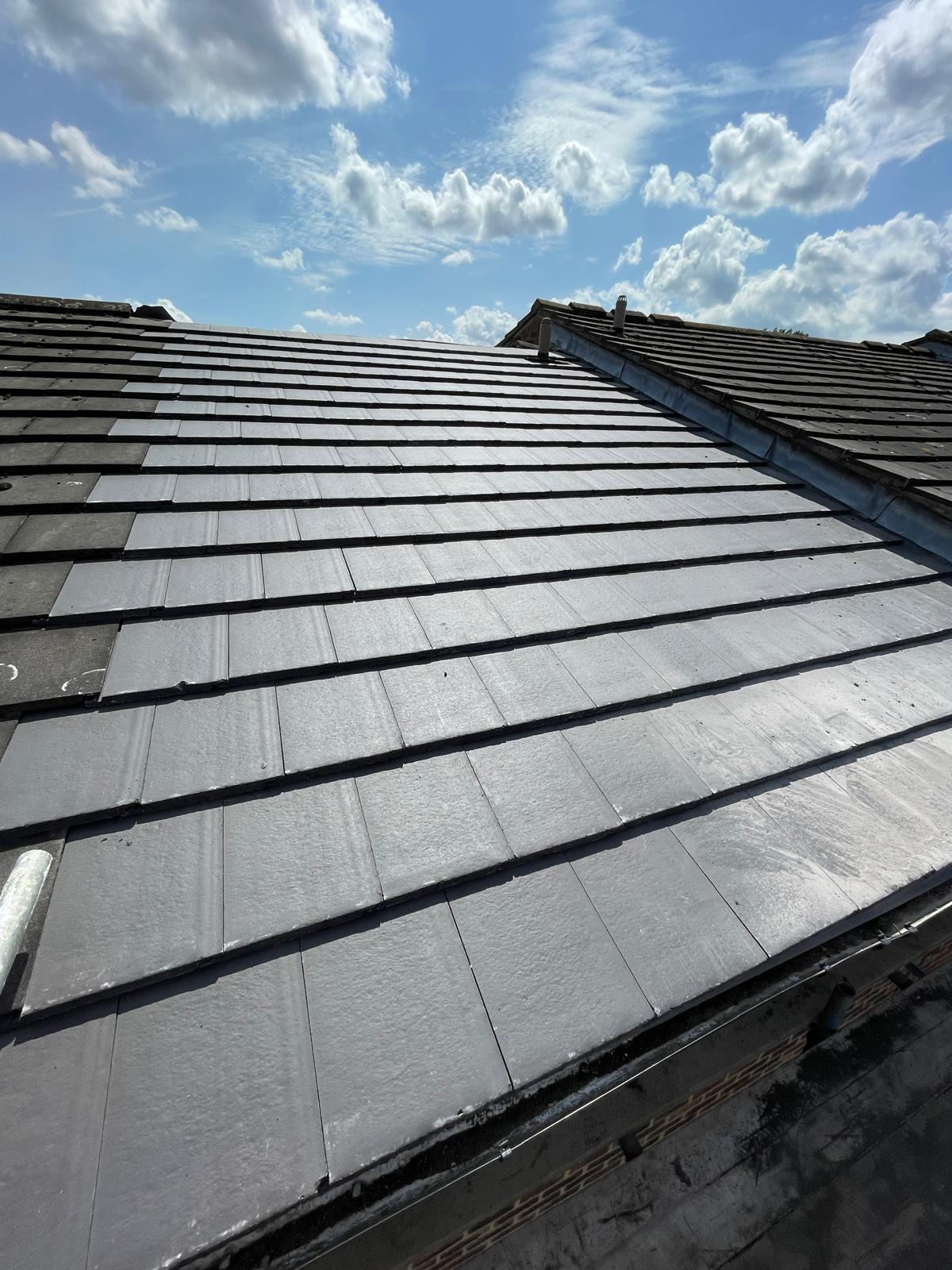 Roof tile installation on the roof repair project