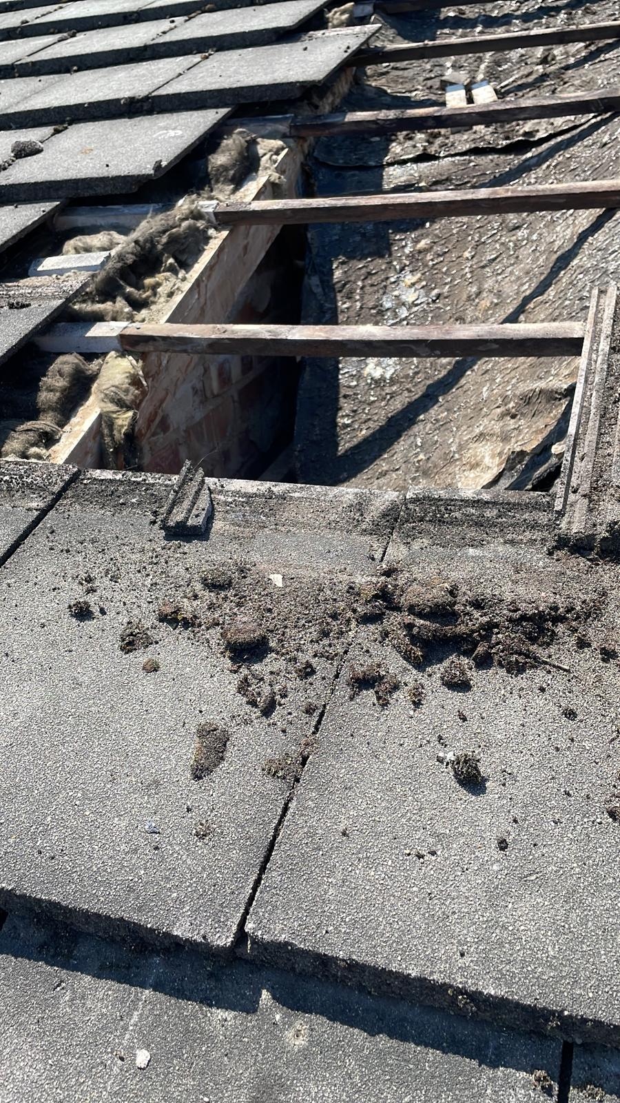 Roof tile removal on a roofing project