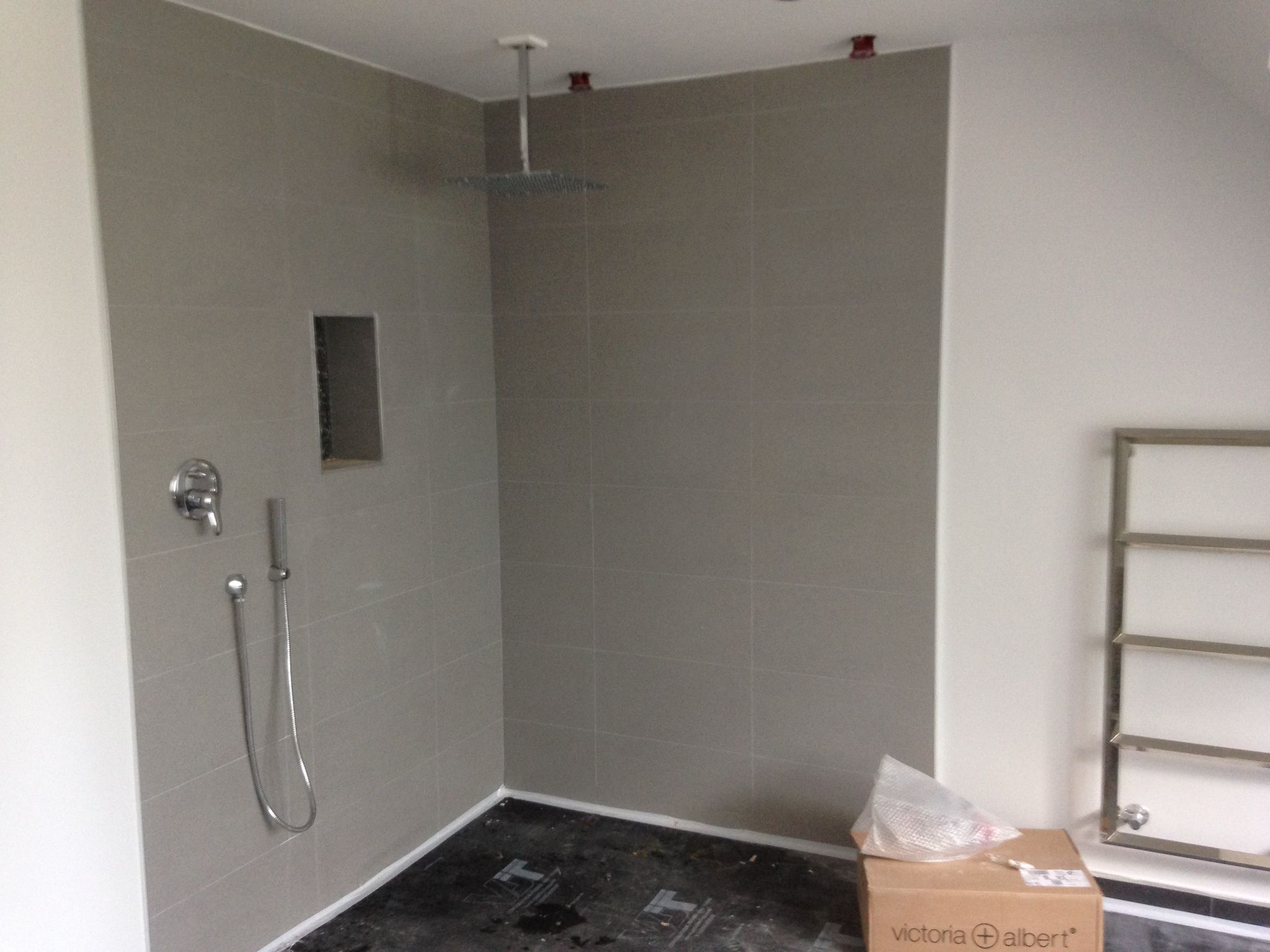 Shower installation with grey wall tile installation