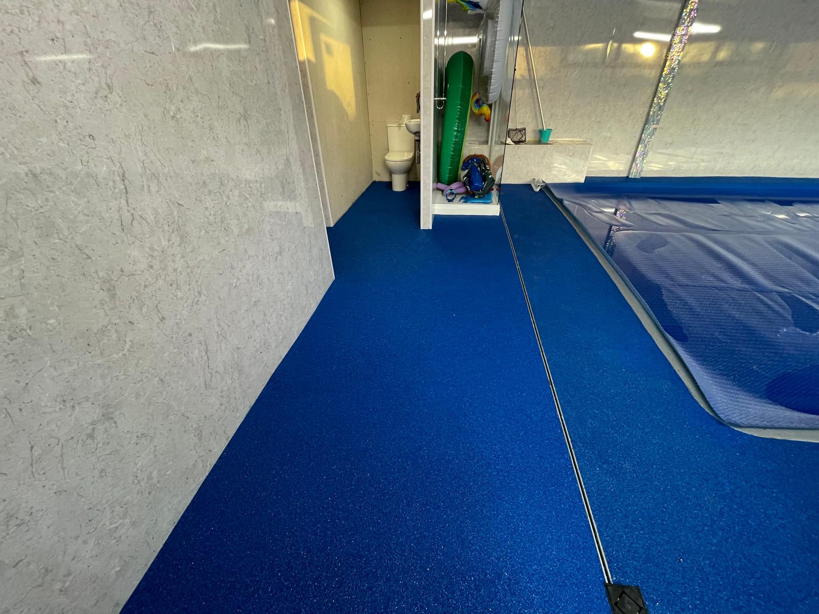 Side view of the swimming pool floor installation