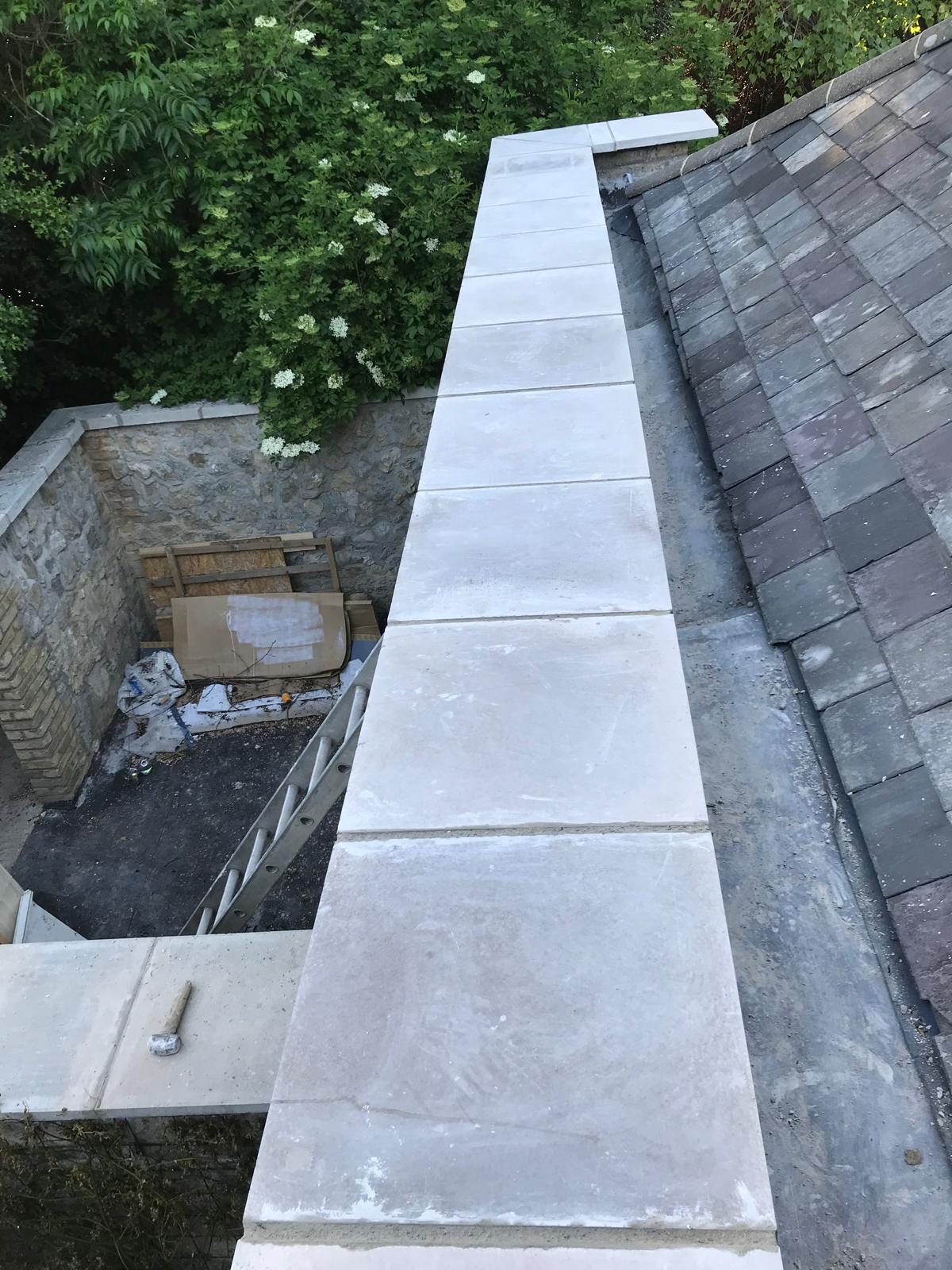 Slab installation on natural stone wall