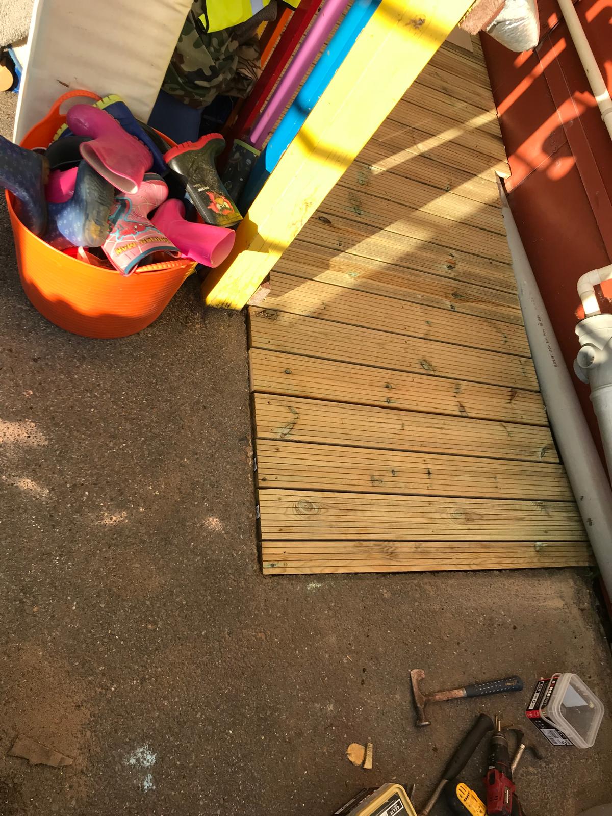 Slope deck board installation in a local nursery