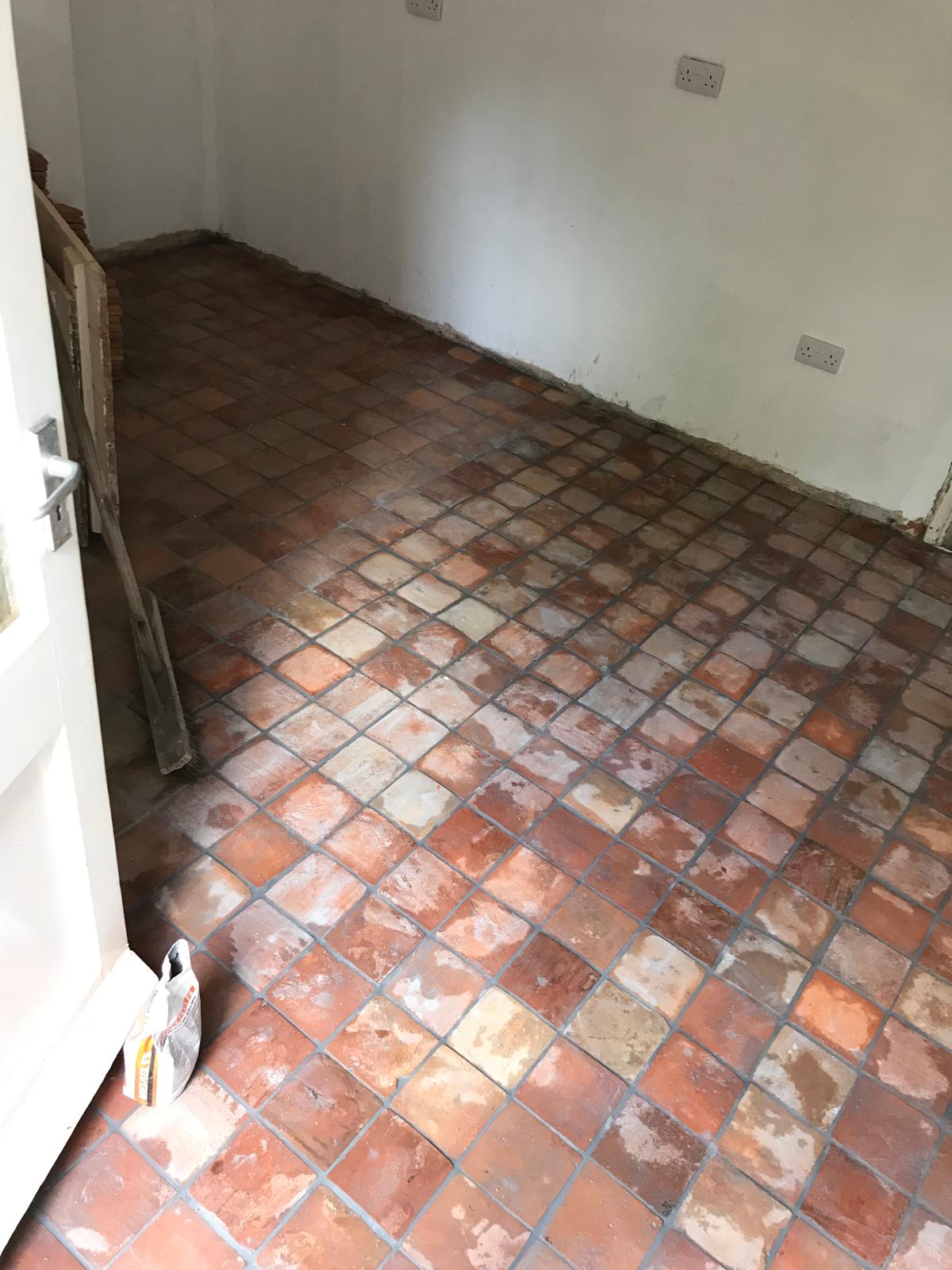 Square terracotta floor tile installation complete on a local project in Kent