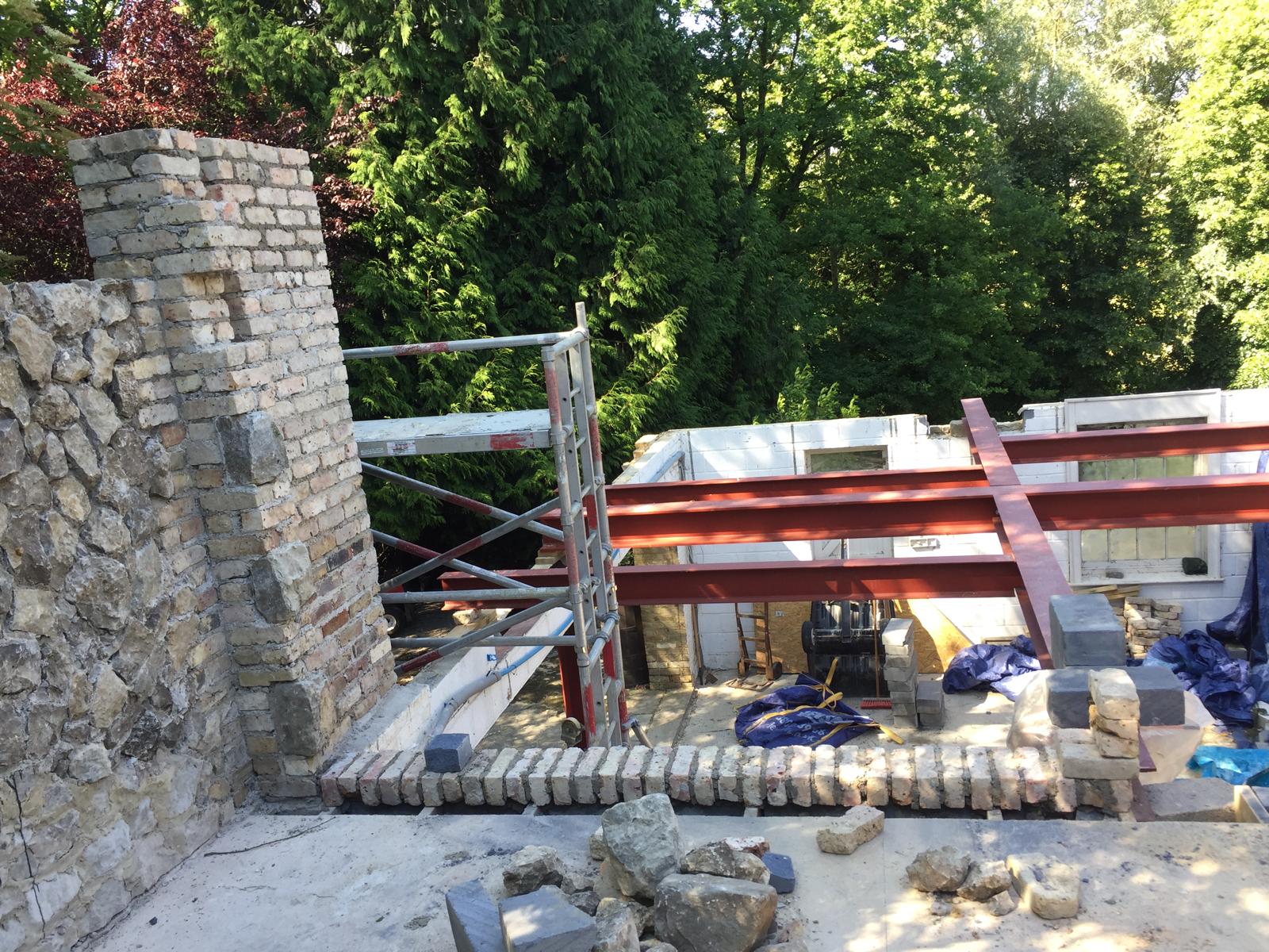 Steel beams installed on a stone extension project