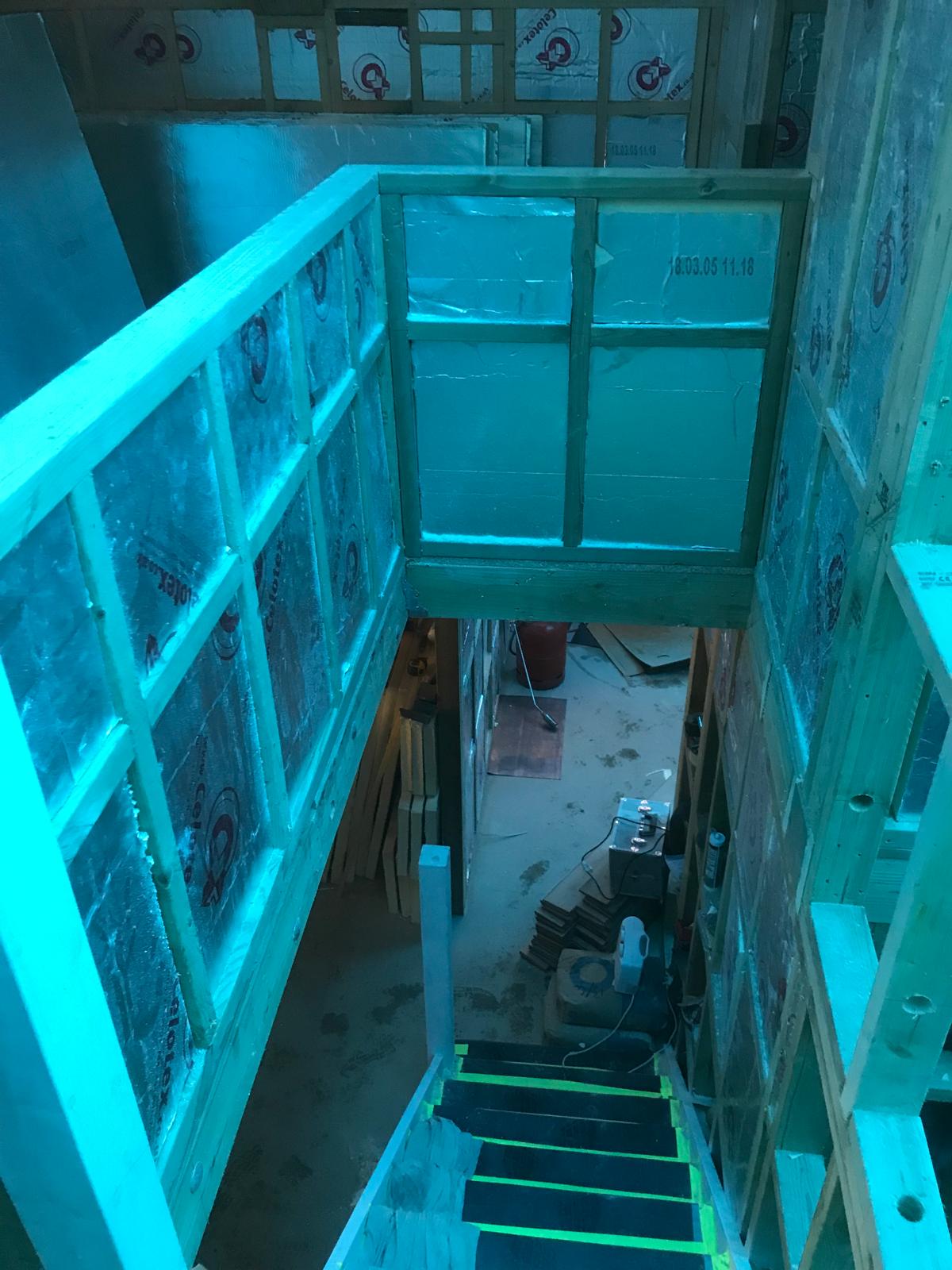 Stone wall extension project insulation installation