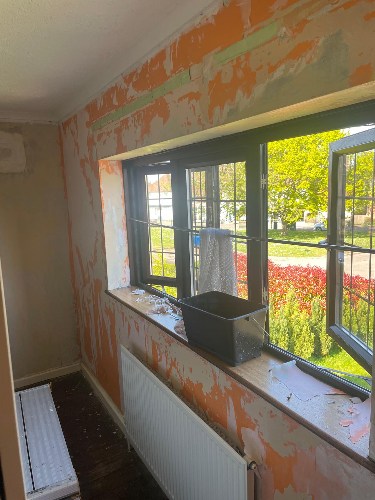 Stripped walls in preparation for a painting project