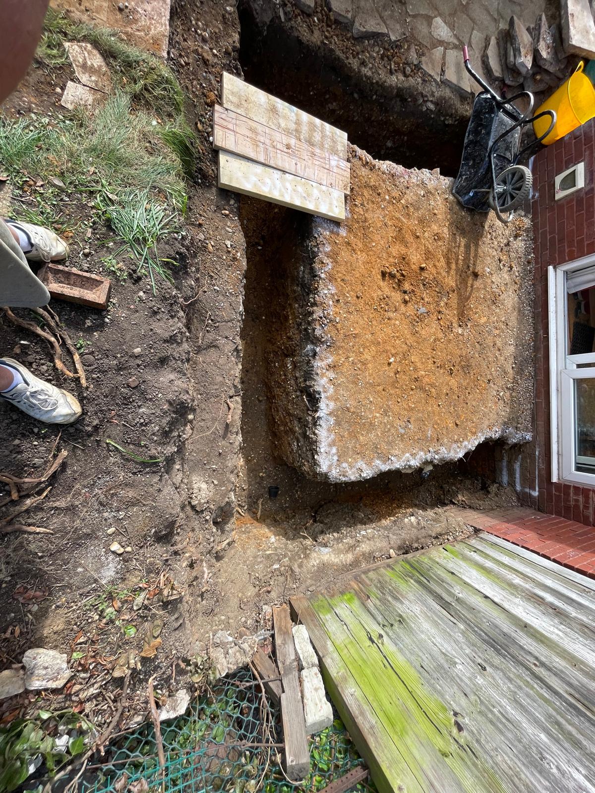 Trench dig out for pipe installation